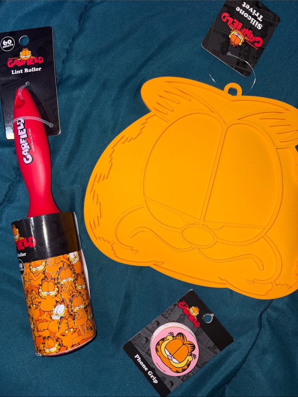 Nickelodeon Garfield Bundle 3 - Silicone Trivet , pop socket, and lint roller